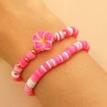 Set di braccialetti bohémien con perline heishi rosa e bianche e ciondolo a fiore - Set 2 Pezzi Rosa Bianco (6360)