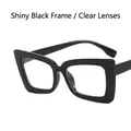 Glossy black cat eye glasses frame with clear lenses in a retro oversized fashion style - Clear Lens / Bright Black