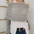 Grey knit shawl scarf with hollow pattern design worn by a model in casual style - Hollow Long Shawl / Light Gray