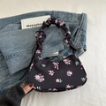 Black crescent canvas bag with pink floral rose and bow patterns and ruched handles - Black
