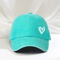 Adjustable mint green washed cotton baseball cap featuring a white embroidered heart - Mint Green