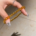 Handheld yellow citrine crystal beaded bracelet with round amber stones in natural light - Amber Transparent Round Bead Style (22#) / 6mm