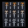 Floral self-adhesive face rhinestones with orange, gold, and white pearls on black backing - MX-015 Orange White
