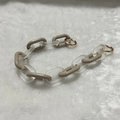 Detail of chunky acrylic chain link strap with khaki resin links and golden clasps - Frosted Dark Apricot
