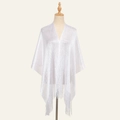 Silver metallic knit shawl with fringe trim displayed on a mannequin for elegant styling - White