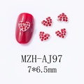Macro shot of MZH-AJ97 red heart rhinestones for nail art showing 7x6.5mm metal charms - Simple Red Rhinestone Heart (AJ97)