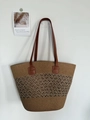 Handwoven straw tote bag with brown faux leather handles and hollow knit design - Coffee Linen