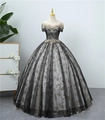 Elegant black choral gown with gold floral lace embroidery and off-shoulder design - Black