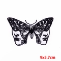 Macro view of butterfly embroidery patch with face details measuring 9x5.7cm - Face Butterfly / 9x5.7cm