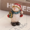 Charming resin snowman Christmas ornament with red hat and green gift box, 6.5cm high - Snowman with Gift