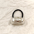Sleek silver metal alloy hair tie with textured hollow ring and black elastic band - Silver Dimple Texture 5.2cm