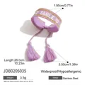 Violettes besticktes Smile-Armband mit Goldrand und Quasten aus Edelstahl - Edelstahl/Baumwollgewebe / Lila Bestickter Webstil (JDB0205035)