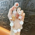 Charming Capybara beaded phone strap with iridescent star and flower charms for girls - Capybara Beaded Charm / Random Hand-painted Beads / White