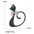 Spilla a forma di gatto in lega con strass e pietra occhio di gatto verde su bianco - Nero