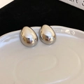 Polished silver egg-shaped hoop earrings with a sleek mirror finish in a pair - Silver Circular Stud Earrings (65#) / Silver