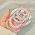 Elastic spiral hair ties in iridescent pastel blue, pink, and white resin finish - 1# Pink/Blue Pearl (4pcs Bag)