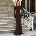 Macro detail of elegant deep brown bodycon dress showing textured waist pleats and fabric - S / Coffee
