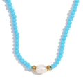 Beaded necklace with sky blue faceted beads and a white freshwater pearl center - Sea Blue Jade-like Beads