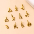 Golden stainless steel twelve zodiac constellation charms in a minimalist grid layout - 12 Zodiac Signs Set (12pcs) / Gold