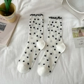 White crew socks with black polka dots and ruffle trim on white fabric background - One Size / Lace Black Polka Dots