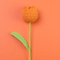 Close-up of handmade crochet tulip flower with orange petals and green stem detail - Orange - Large Single Stem