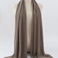 Brown chiffon hijab scarf with lightweight breathable texture on mannequin display - 18