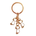 Golden metal keychain with three white enamel cat charms in various poses for cat lovers - White (3 Cat Charms)