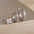Detailed macro view of S925 sterling silver clover studs and zircon hoop earring set - Silver (Y26071-1)