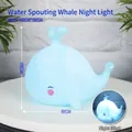 Blue whale bedside night light made of matte silicone for soft bedroom illumination - Blue Spouting Whale