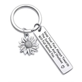 Detail of sunflower pendant and engraved inspirational quote on stainless steel keychain - Keep Your Face Always Towards The Sunshine