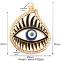 Golden Evil Eye pendant with blue enamel and sparkling zircons in a 37mm teardrop shape - Jumbo Teardrop Evil Eye / Large Gold