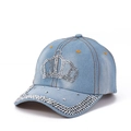 Close-up of sparkling rhinestone crown pattern on light blue denim baseball cap - Adjustable / Blue Denim Texture