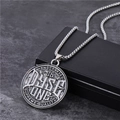 Hip hop silver Cuban chain with Handcrafted Dyse One round alloy pendant on black surface - Retro Badge Pendant