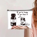 Close-up of canvas makeup bag with cartoon medicine prints and a metal zipper detail - Pill Bottle Smile Minimalist Style (jiayingpbb0279)