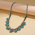 Detailed close-up of Bohemian layered necklace with turquoise stones and rhinestone clusters - Necklace-Blue