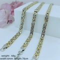 Three-piece gold and silver braided titanium steel necklaces on a white display stand - 6mm*70cm / Steel Gold