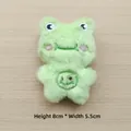 Detail of a plush light green frog toy with embroidery, measuring 8cm high and 5.5cm wide - Full Body Frog