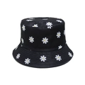 Close-up detail of small daisy print patterns on a black canvas fisherman sun hat - M (56-58cm) / Black White Daisy (F)