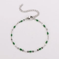 Detail of silver stainless steel chain with green enamel lip charms and lobster clasp - Silver + Dark Green Enamel