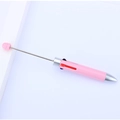 Pink multifunctional beaded pen with retractable pointer and multi-color writing options - Khaki Pink