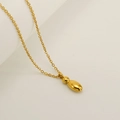Minimalist golden bubble letter pendant necklace with smooth metallic finish on white - Letter I / Gold