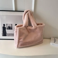 Chic pink faux fur tote bag for women featuring a minimalist soft plush texture design - Pink