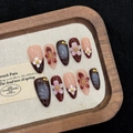 Almond press-on nails set with red marble patterns and 3D floral accents in wooden tray - XS / 3015-Mid Almond