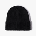 Classic black ribbed knit beanie with a thick folded cuff for winter fashion - One Size / Black
