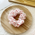 Sweet white scrunchie with red polka dots on a wooden tray for elegant hair styling - White with Red Polka Dots