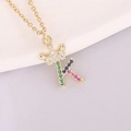 Close-up of 18K gold crown and letter K pendant with colorful cubic zirconia stones - Letter K Style