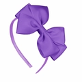 Simple girls purple headband with a large handmade grosgrain ribbon bow on white background - Purple