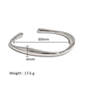 Detail showing irregular wavy 18K plated titanium steel cuff with 60mm inner diameter - Wave Shape Style (HF-B5122-S)