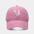 Close-up of pink washed cotton baseball cap featuring detailed white cow embroidery - Adjustable / Pink