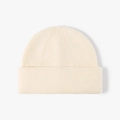 Minimalist cream white knitted beanie hat with textured ribbed and pearl knit pattern - Cream